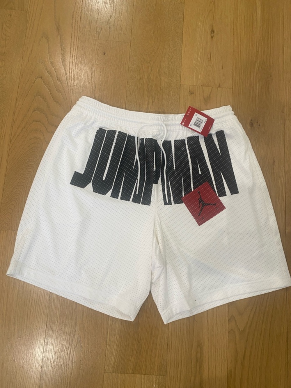 Jordan White Mesh Athletic Shorts with Black JUMPMAN Lettering